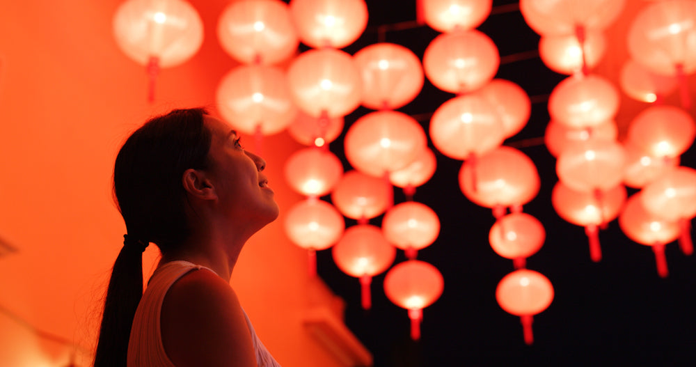 A woman looking at Lunar New Year lanterns